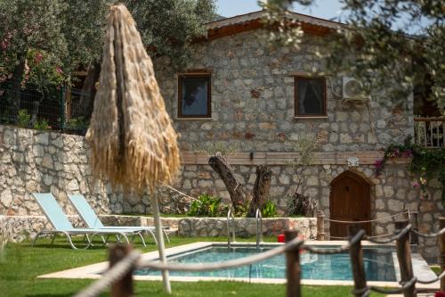 Faralya Villa | Stone House with Pool Among Olive Trees in Kabak
