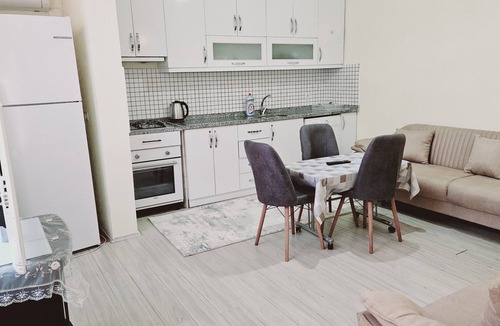 Kas Condo | Ferah Yüksek Bahçe Katı daire