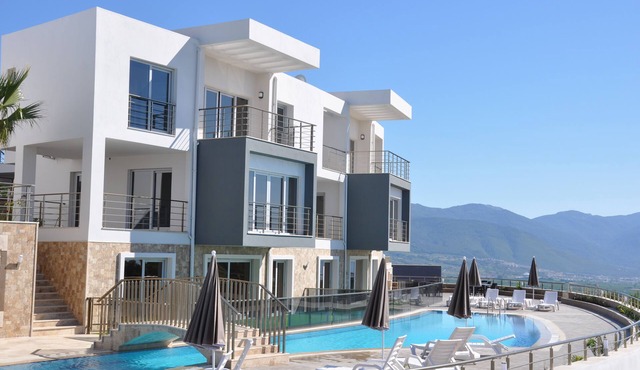 1+1 Luxury Apartment at Kusadasi Sogucak, facing to Turquoise color Aegean Sea in Sogucak