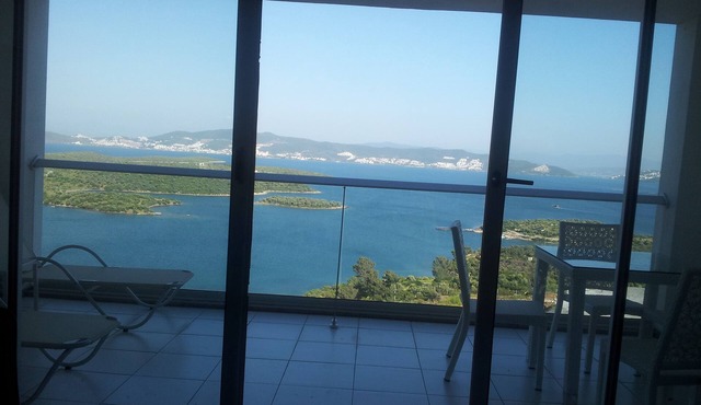 A modern to bedroom luxury apartment, in a resort overlooking the Aegean Sea.