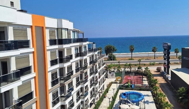 Cozy 2-bedroom apartment in Finike with a sea view, pool, sauna and gym in Finike