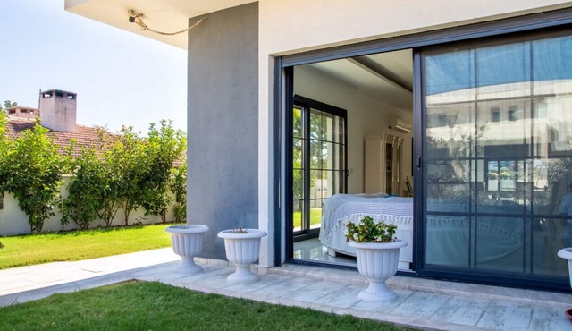 Sleek Villa with Private Pool and Garden in Cesme