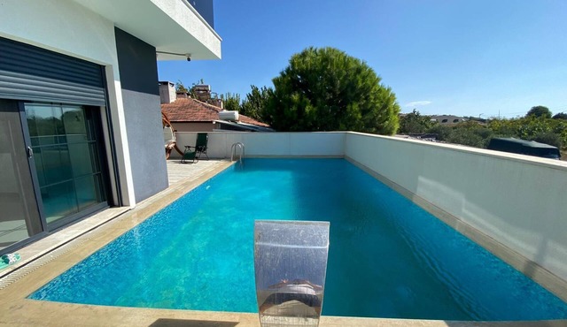 Welcome to your peaceful home with a pool in the center of Çeşme