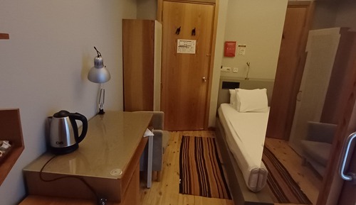 Corner Room with Brick Wall