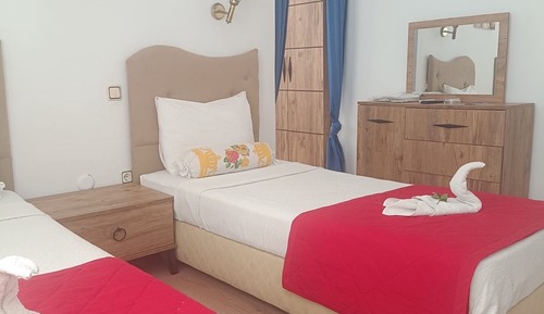 Basic Triple Room, Multiple Beds, Balcony, Beachside