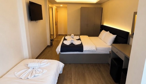 Deluxe Triple Room