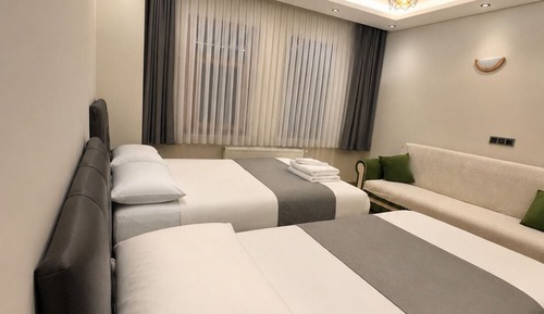 Deluxe Quadruple Room, Garden View