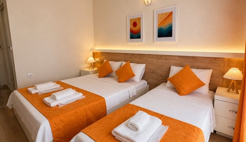 Family Triple Room, Balcony, Garden View