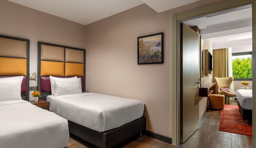 One Double and Two Single Bed Family Room Pool View