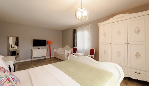 Deluxe Triple Room, Balcony, Pool View