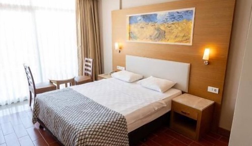 Deluxe Triple Room, Balcony, Garden View