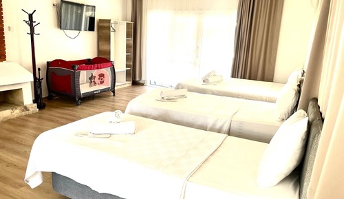 Quadruple Room, Balcony, Garden View