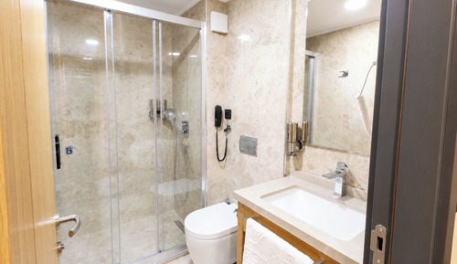 Deluxe Quadruple Room, City View