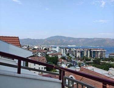 One-Bedroom Apartment with Balcony and Sea View