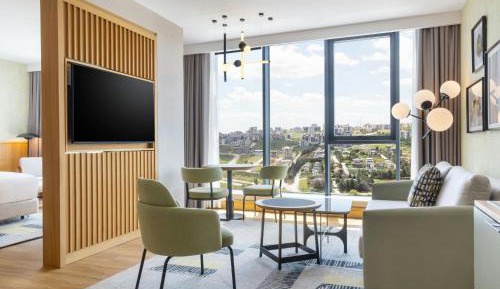 One-Bedroom King Suite with Sofa Bed and City View