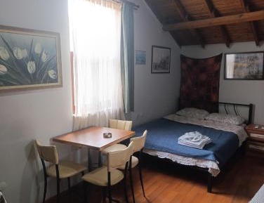 Quadruple Room with Private Bathroom