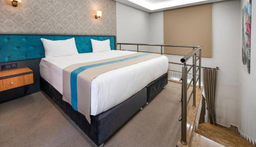 Duplex Suite with 1 Queen Size Bed and Sofa