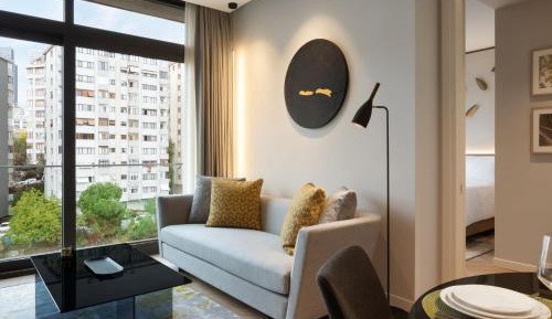 One Bedroom Larger Apartment with Balcony and City View