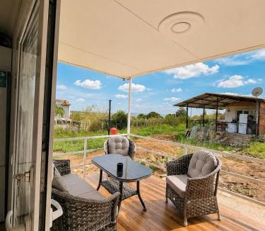 Karaoz House | Cozy Retreat Near Airport Patio & Nature
