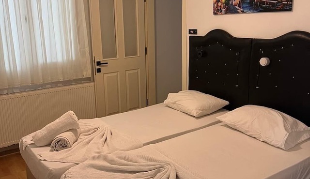 Merkez Pansiyon Sarımsaklı