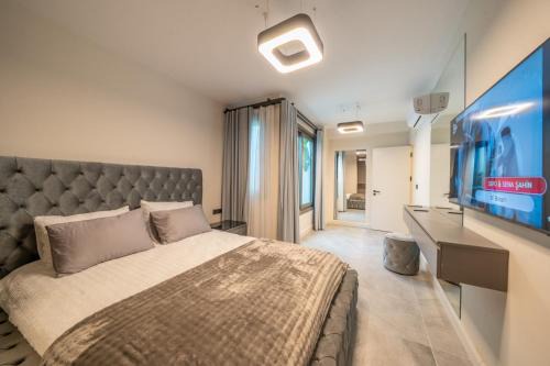 MAVIIE Luxusvilla mit Pool & Meerblick in Yalıkavak Geris