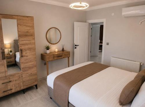 Airport Deluxe Suites Otel
